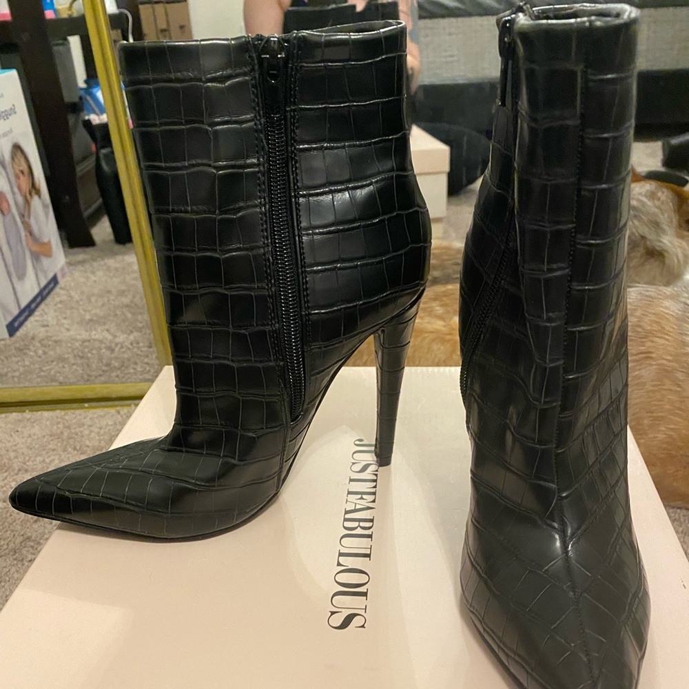 Black stiletto heeled booties